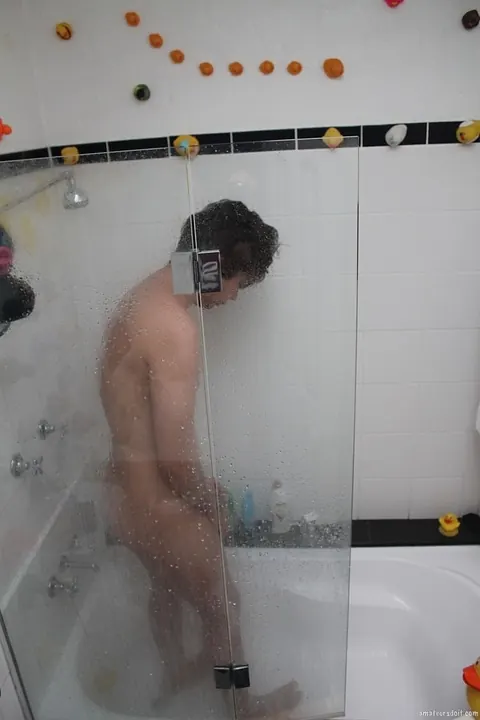 Man Strips Nude and Shows Off in the Bathroom – photo 12 of 21