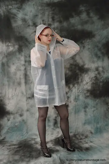 Redhead in a Latex Skirt and Stockings Gets Tied Up