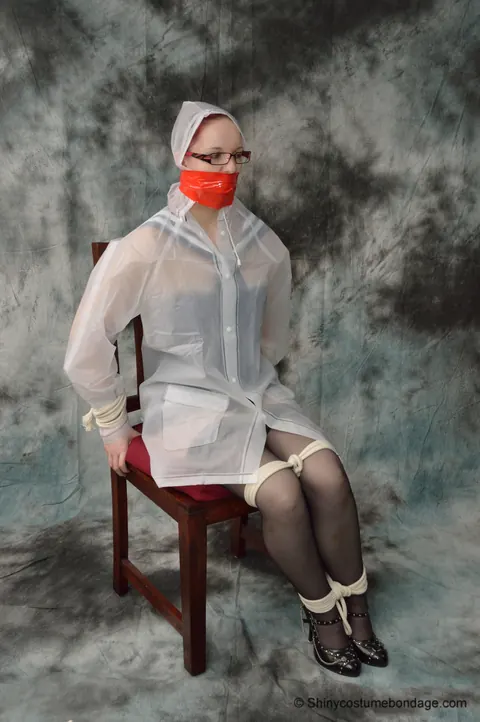 Redhead in a Latex Skirt and Stockings Gets Tied Up – photo 11 of 16