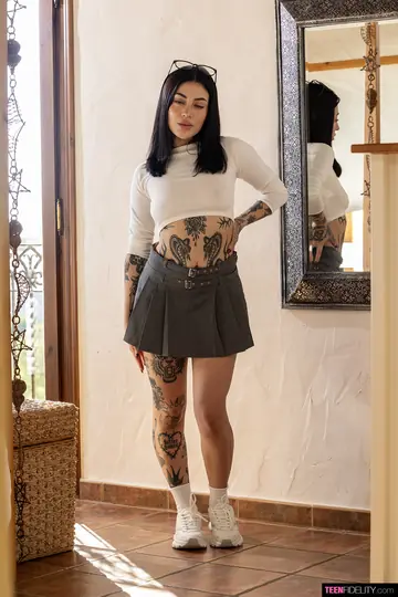 Tattooed Latina Strips Off Her Skirt to Show Stockings and Socks