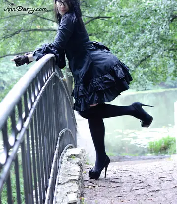 Thick Asian Woman Flashes Her Big Ass in Stockings and Glasses Outdoors