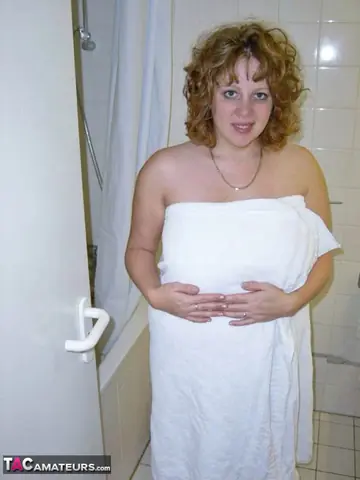 Curvy Claire – British Redhead MILF Spreads Her Hairy Pussy in the Bathroom