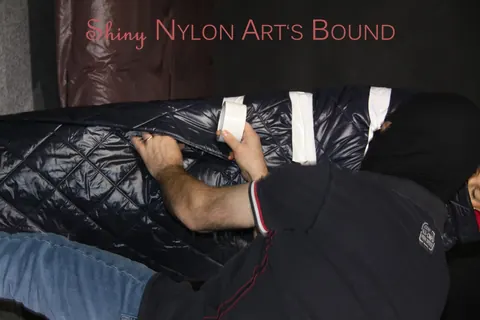 Woman in Stockings Bound Under Heavy Layers – photo 4 of 16