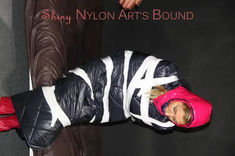 Woman in Stockings Bound Under Heavy Layers – photo 12 of 16