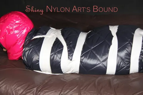 Woman in Stockings Bound Under Heavy Layers – photo 14 of 16