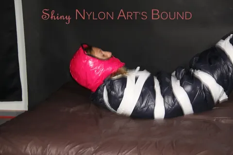 Woman in Stockings Bound Under Heavy Layers – photo 13 of 16
