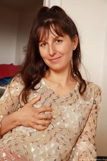 Thick Mature Woman in a Skirt Pulls Panties Aside and Spreads Her Hairy Pussy