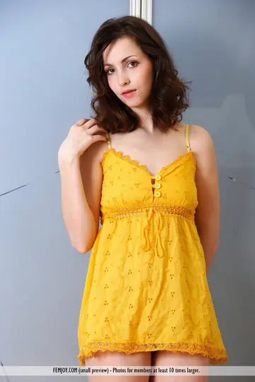 European Brunette Lifts Her Skirt to Spread Her Shaved Pussy