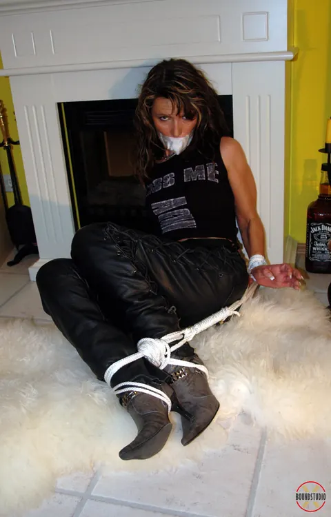 Brunette Bound and Gagged in Leather Pants and Heels – photo 12 of 16