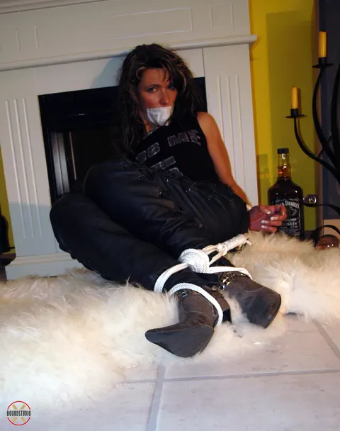 Brunette Bound and Gagged in Leather Pants and Heels – photo 16 of 16