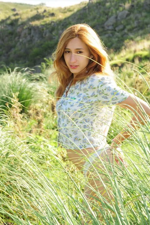 Latina Woman Strips Nude and Poses – photo 1 of 21