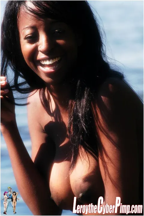 Ebony Babe Frees Big Tits Outdoors in a Bikini – photo 6 of 16