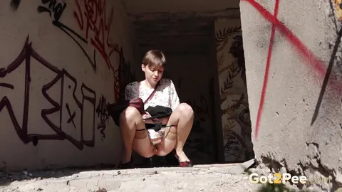 Short-Haired Woman in Stockings Squats to Piss Outdoors – photo 6 of 15