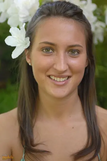Outdoors, a Brunette Bares Her Big Natural Tits and Spreads