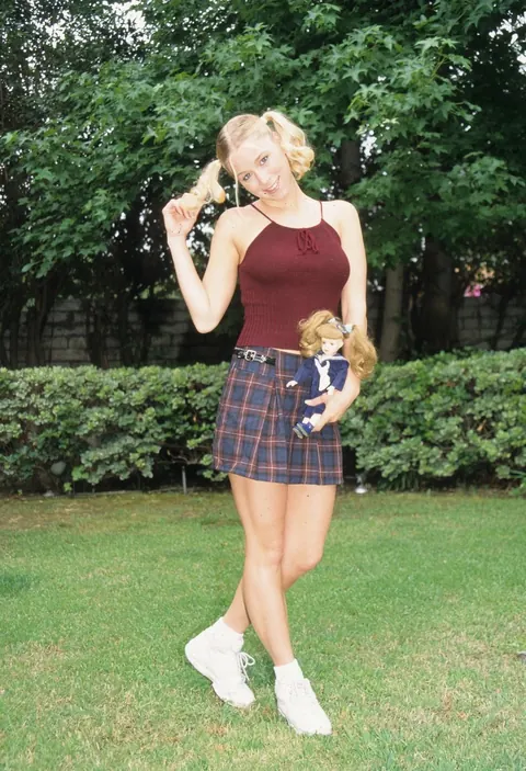 Skinny Babe Teases in a Skirt and Panties Outdoors – photo 16 of 20