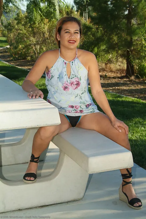 Thick MILF Lifts Her Dress and Spreads in Public – photo 12 of 21