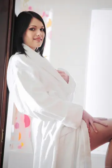 Brunette Raises Her Legs and Spreads Her Pussy Wide