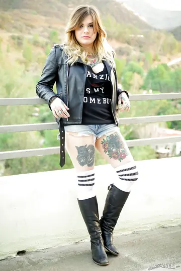 Busty Tattooed Brunette Strips Outdoors in Socks and Spreads