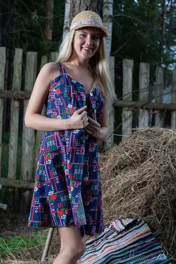 Blonde Strips Out of Her Dress and Spreads Her Legs on Straw Outdoors
