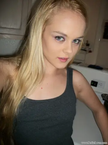 Slim Blonde Shows Her Natural Tits and Pussy in the Kitchen Selfies
