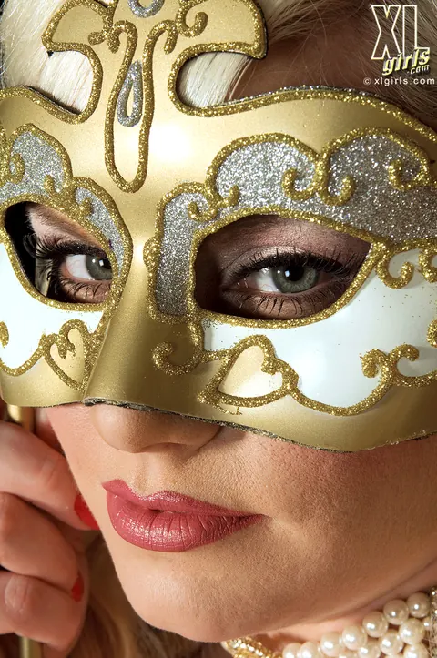 Tiffany Blake: Blonde BBW in Stockings Removes Mask and Bares Her Big Tits – photo 1 of 10