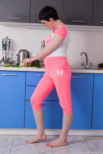 Russian MILF Shows Her Hairy Pussy and Fingers Herself in the Kitchen