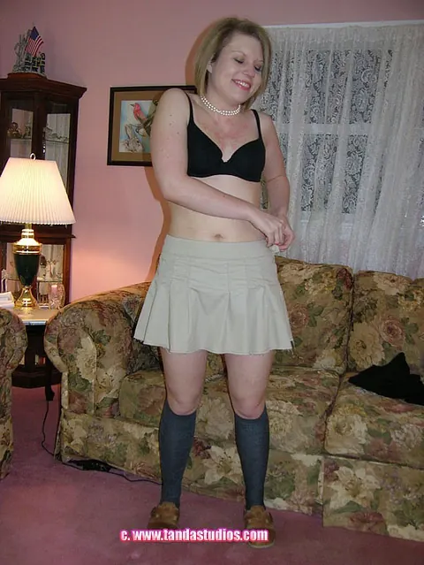 Veronica Snow: Short-Haired Blonde MILF in Socks Strips to Show Her Pierced Pussy – photo 9 of 20