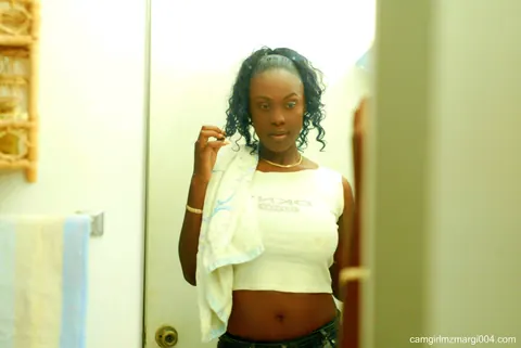Marguerite Martin: Tall Ebony MILF Shows Her Big Natural Tits in the Bathroom – photo 3 of 15