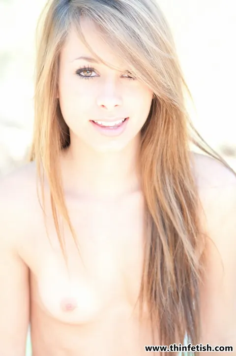 Riley Jensen: Petite Redhead Plays with a Dildo on a Towel by the Pool – photo 7 of 16