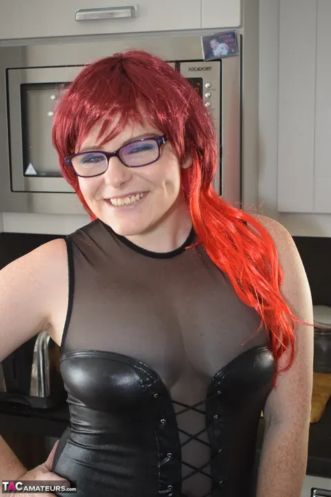 Mollie Foxxx: Tattooed Redhead MILF in Lingerie and Glasses Shows Her Big Tits – photo 1 of 20