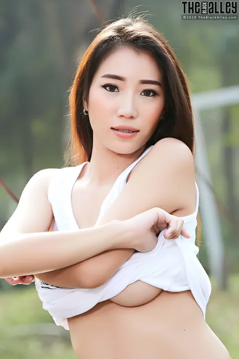 Thick Asian Brunette Flashes Her Tits and Ass in a Short Skirt – photo 10 of 16