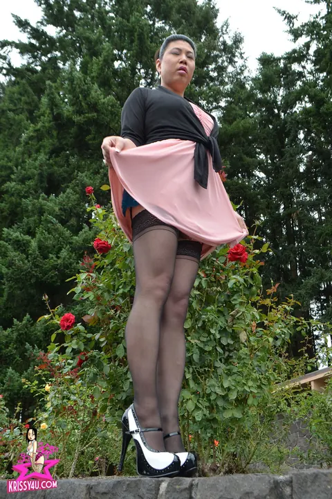 Curvy Trans Woman Flaunts Stockings and Heels Outdoors – photo 14 of 16
