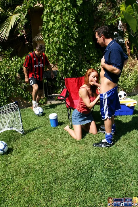 Janet Mason: Busty Redhead MILF in Heels Sucks Two Cocks in the Garden Threesome – photo 4 of 21