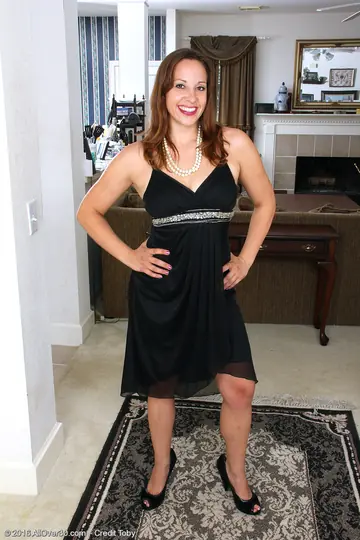Thick Brunette MILF Strips Out of Her Dress and Panties to Finger Herself