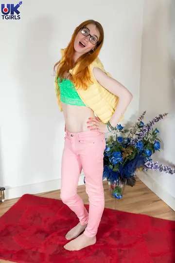 Redhead Trans Woman in Stockings Spreads Her Legs
