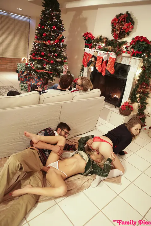 Angel Smalls: Two Brunettes Share a Cock in a Christmas Threesome – photo 15 of 18
