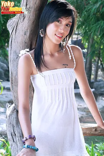 Thai Brunette in a Skirt Uses a Dildo on Hairy Pussy