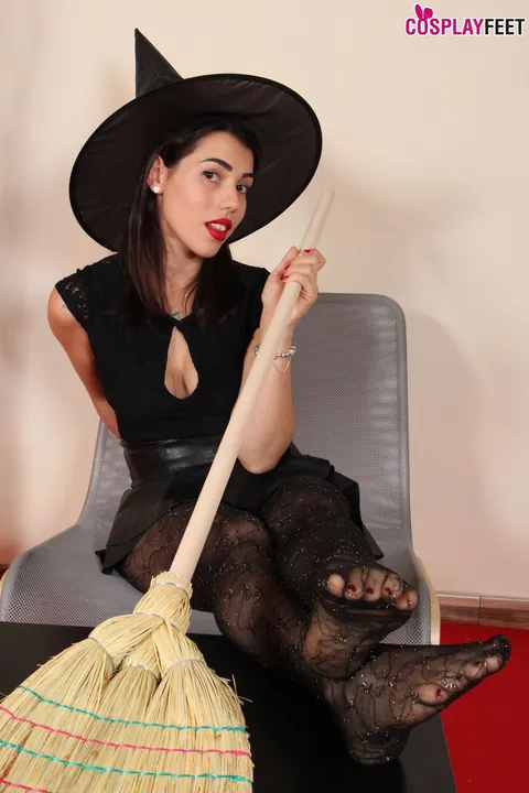 Brunette in Witch Costume and Pantyhose Shows Off Her Toes – photo 10 of 10
