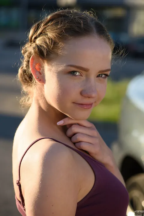 Faina Bona: European Blonde with Big Tits Pulls Panties Aside in the Car – photo 1 of 12