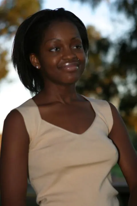 African Brunette Shows Her Breasts and Dark Nipples Outdoors – photo 7 of 20