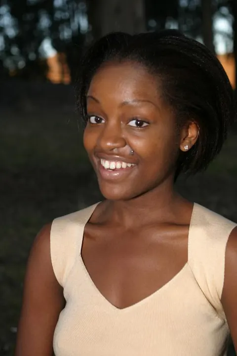 African Brunette Shows Her Breasts and Dark Nipples Outdoors – photo 5 of 20