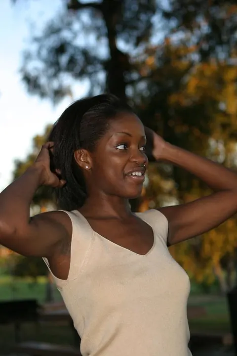 African Brunette Shows Her Breasts and Dark Nipples Outdoors – photo 12 of 20