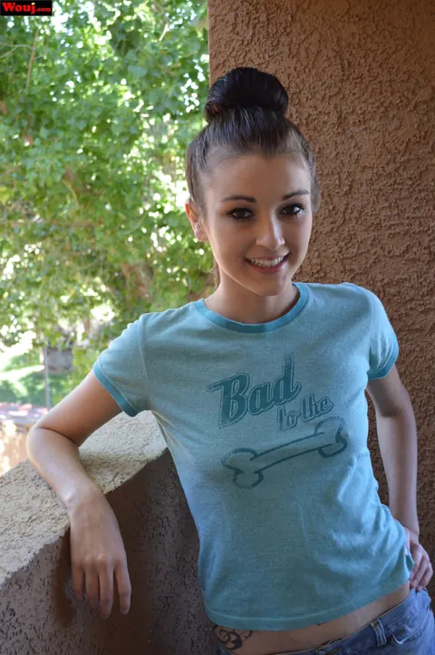 Brunette Teases in a Denim Skirt Outdoors – photo 13 of 15