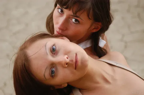 Two Lesbians Kiss and Spread Their Pussies Together – photo 18 of 21