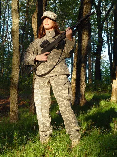 Busty Military Babe Shows Lingerie and Bikini in the Forest – photo 2 of 15