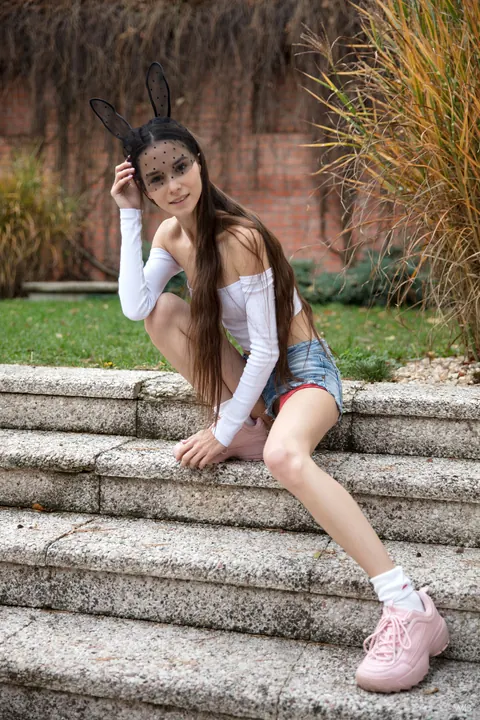 Leona Mia: Skinny Russian Brunette Strips and Spreads on the Garden Steps in Socks – photo 1 of 20