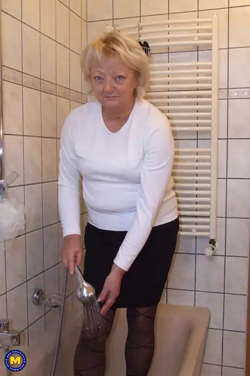 Mature Woman in Pantyhose Gets Messy in the Shower Then Spreads Her Pussy