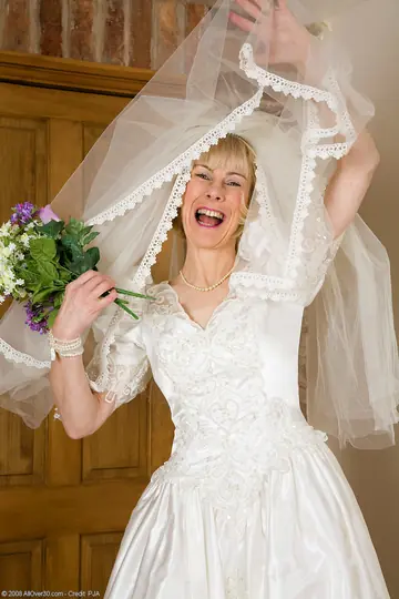 Blonde Bride Strips Off Her Wedding Dress to Show Stockings and Hairy Pussy