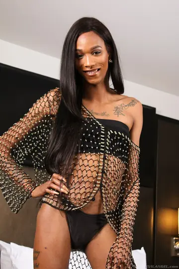 Slim Ebony Trans Woman Poses Nude and Shows Her Cock