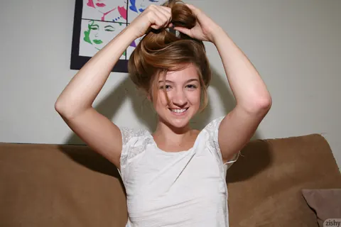 Slim Brunette Poses in Shorts and Panties to Show Her Body – photo 4 of 11
